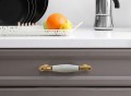 Uchwyt meblowy złoty z białą porcelaną na 96 mm -Florani 18