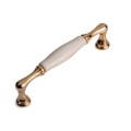 porcelanowy uchwyt do mebli złoty kremowy 128 mm asti giusti.jpg
