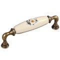 Decorani- stary mosiądz uchwyt ceramiczny z kwiatkiem 128mm.jpg
