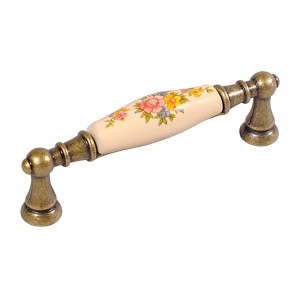 Flora 09 -  stary mosiądz z ciemno kremową porcelaną uchwyt do mebli 96mm